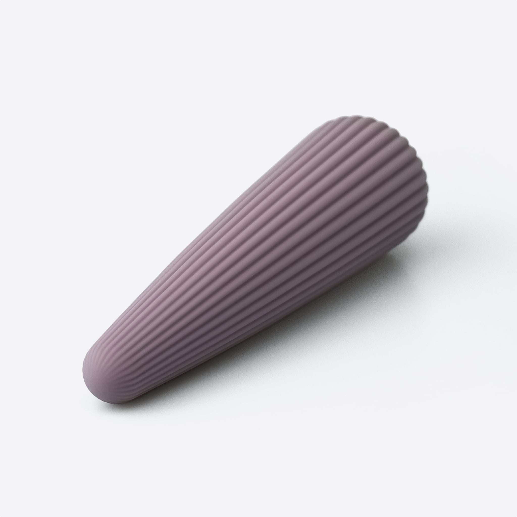 Amina Cone II lilla genopladelig klitoris vibrator liggende